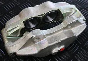 L/H Brake Caliper front fits Defender upto chassis KA solid Brake discs